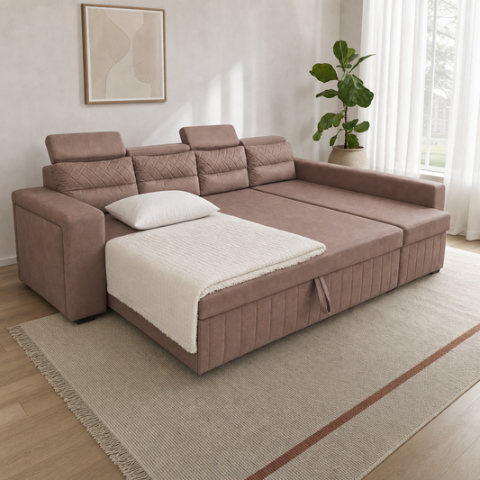 Alben sofa bed styled as a guest bed with an ivory quilt and pillow