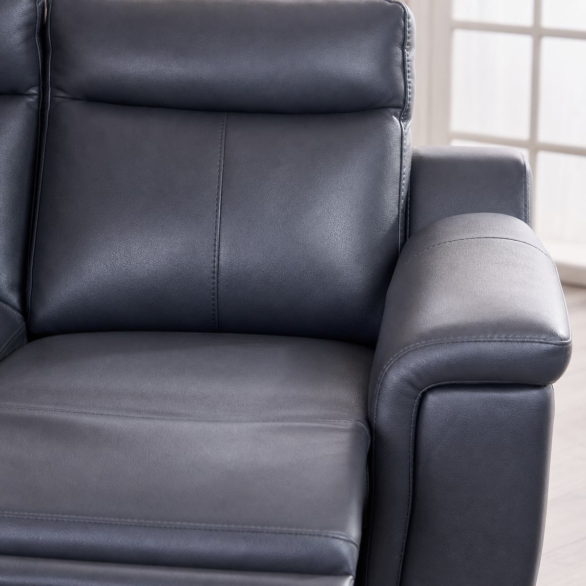 Aurora Recliner upholstery and reclining detail