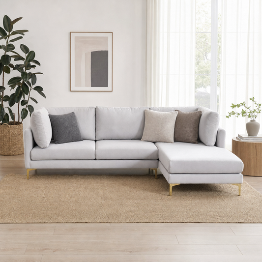 Glitz - L shape sectional sofa in light silver-grey fabric, front view in a modern living room