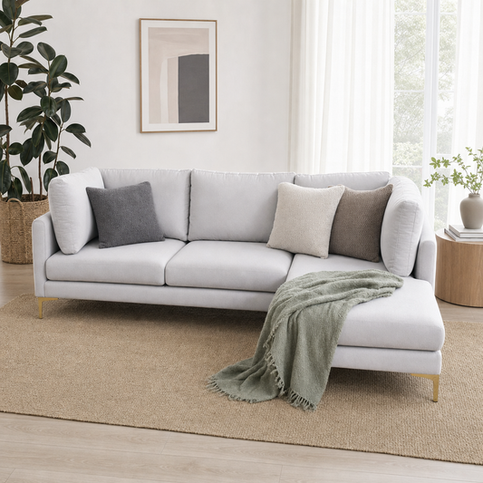 Glitz - L shape sectional sofa styled with a sage-green throw