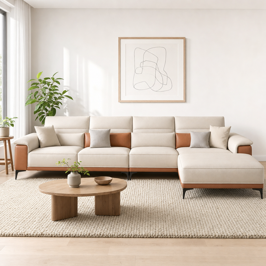 Muse - L shape sectional sofa in ivory-cream with terracotta-tan accents (two-tone leathaire), front view in a modern living room
